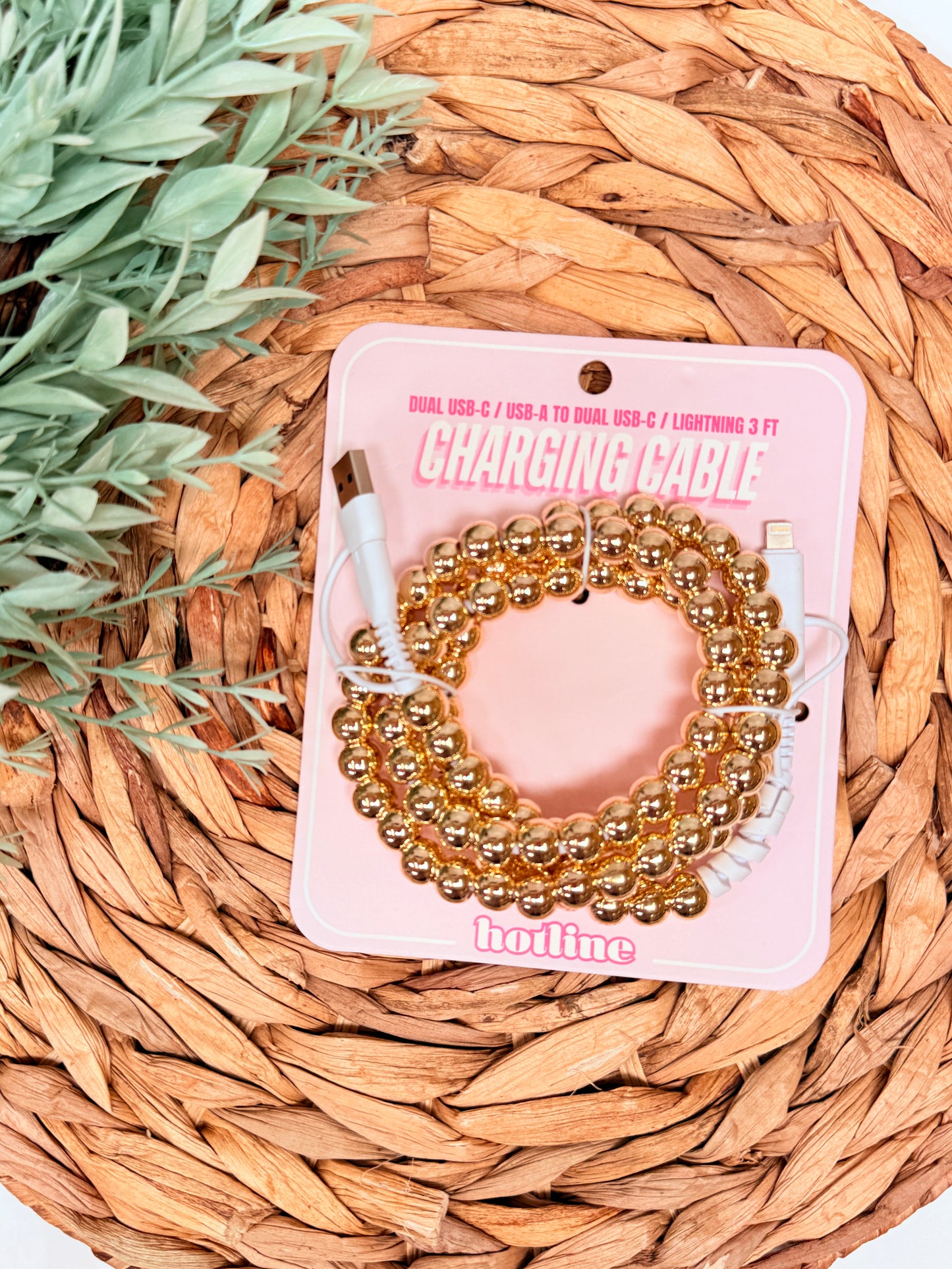 Gold beaded universal charger.