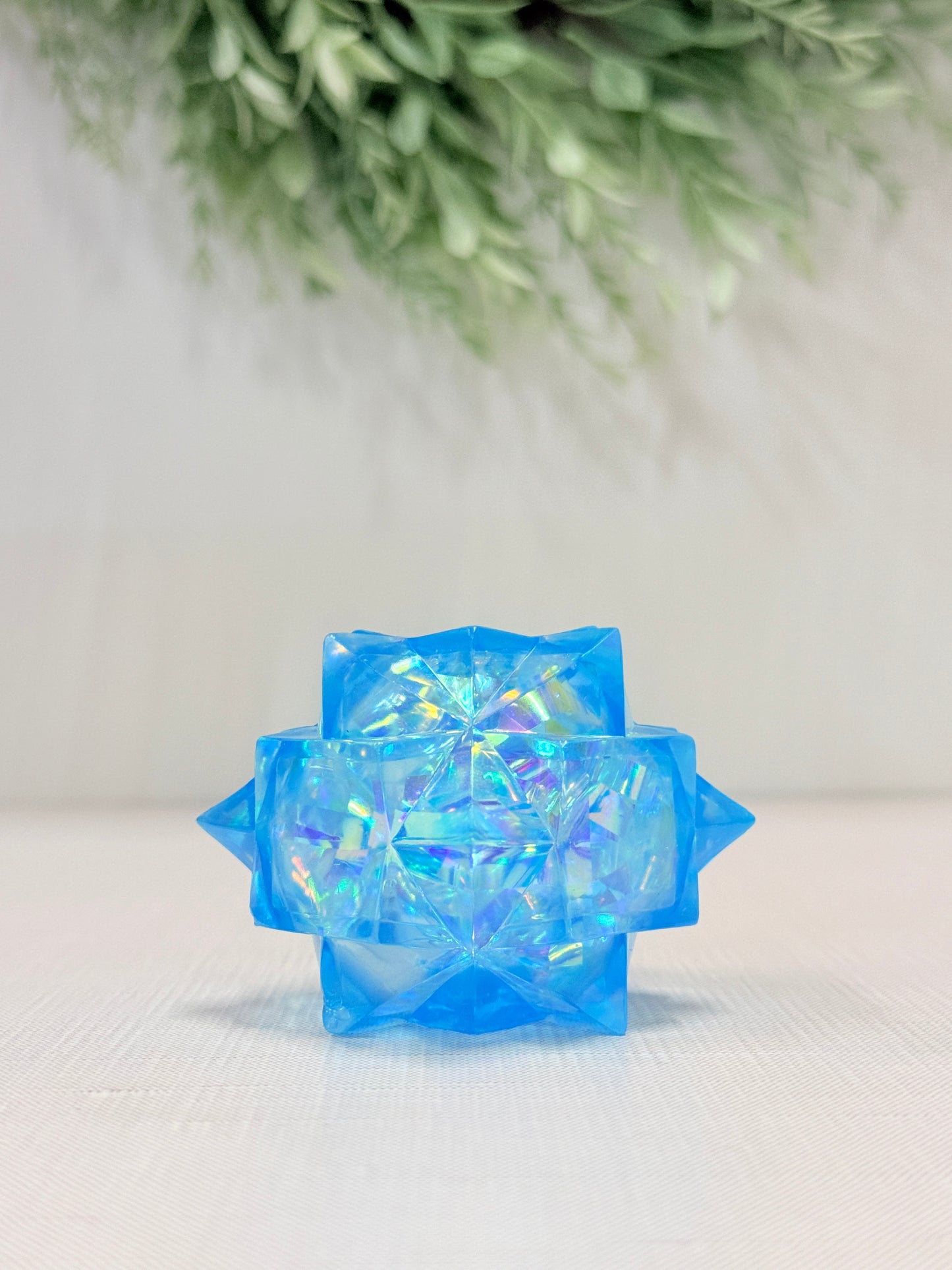 Yummee Gummee Squish Crystal sensory toy in pink, blue, purple, and white