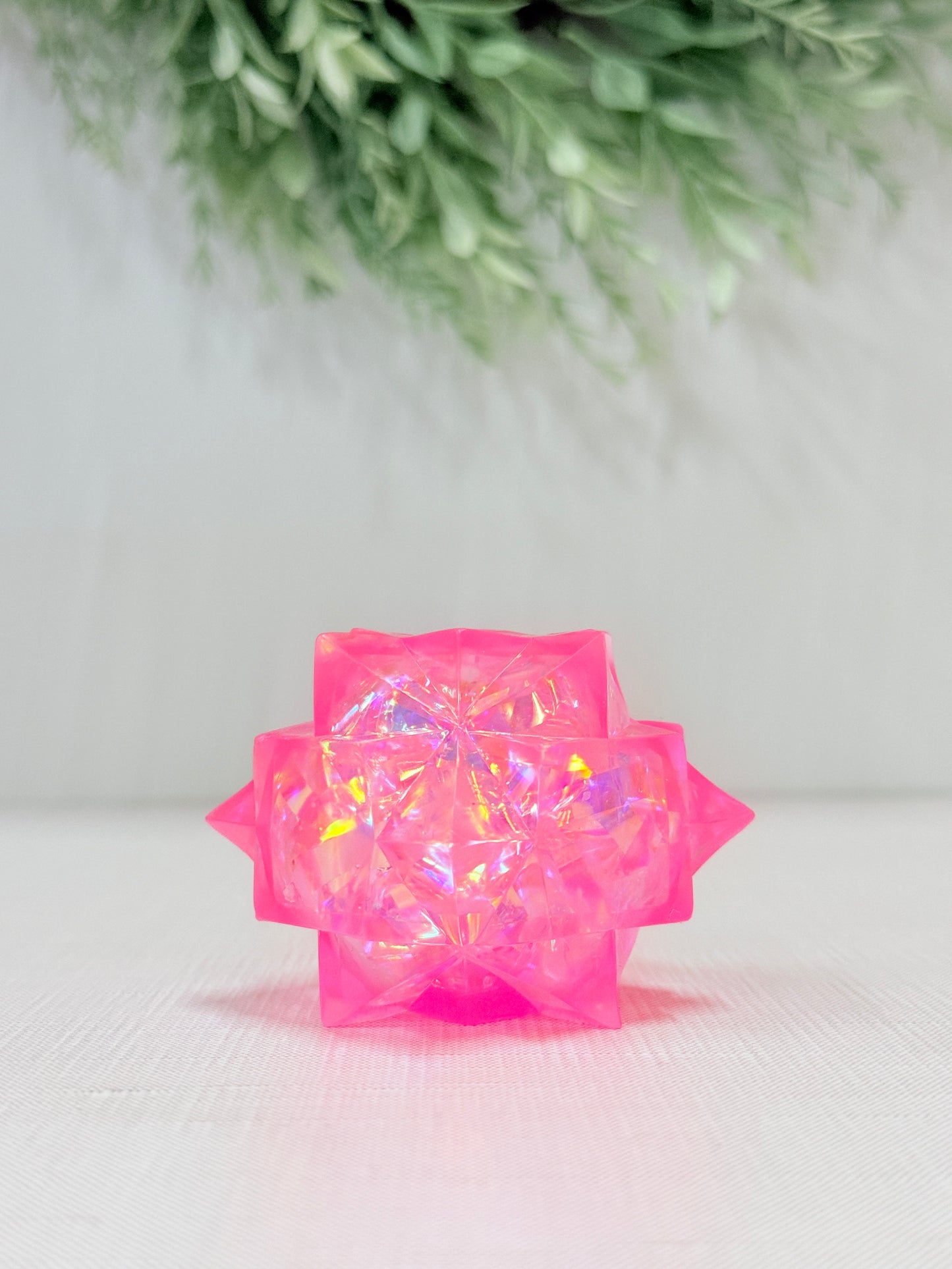 Yummee Gummee Squish Crystal sensory toy in pink, blue, purple, and white