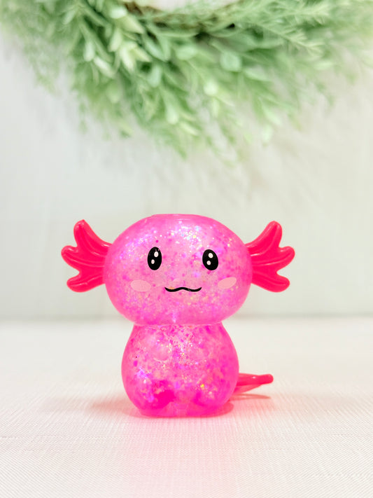Glittery axolotl squish toy in pink sensory fidget