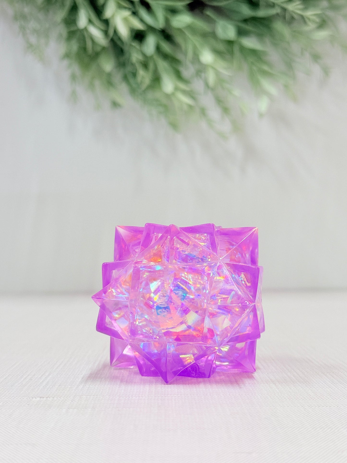 Yummee Gummee Squish Crystal sensory toy in pink, blue, purple, and white